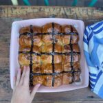 Annabel Crabb Instagram - Easter buns from @notquitenigella’s terrific Tangzhong method hot cross bun recipe - gosh it is a winner. I have one kid who won’t do fruit so some of them have white chocolate and the rest have dried apricot. The recipe makes exactly enough for nine in@my @mudaustralia baker thing. Very pleasing. And thanks to the fruit-eating kid for styling