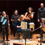 Annabel Crabb Instagram - This is the moment on Tuesday night at which Scottish-born classical accordionist James Crabb viciously pranked @leigh_sales by handing her a BOOBYTRAPPED squeezebox on stage at the Opera House in front of the @australianchamberorchestra. Image captured by @mr_stephenblake who will be punished separately as he was forewarned of the gag. Now I know what they say: “Never a fistfight picking be With a man who was birthed in Dundee” But I say to you, squeezebox man. This Adelaide Plains bogan has one more show with you, TONIGHT at Hamer Hall @artscentremelbourne. And at some point in that ninety minutes, I will END you. Capiche? @chat10looks3 Tickets still available. Bring swabs.