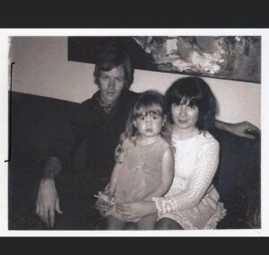 Anne Rice Instagram - This is @christopher.rice.writer. Michele Rice, Anne’s daughter, would have turned 56 today had she not been taken from us so cruelly at such a young age by an aggressive form of leukemia that at the time was almost impossible to treat in young children. Michele's life and death were no doubt the inspiration for the child vampire Claudia in the novel "Interview With The Vampire", a fact that my mother came to accept later in life. I was born several years after her death. Around the age of six I accidentally learned of her existence for the first time. A teacher who assumed I'd been told about her made a sympathetic reference to her death in front of our classroom. In the years that followed that stunning instant, my parents generously shared their memories of Michele in those moments when I was filled with questions about her that burned with a child's curiosity. Michele laughed and joked even when sick. Her child's mouth struggled the word "take" and she'd often asked my parents if they'd "caked a shower", which filled their heads with comic images. Her nickname was Mouse. Happy Birthday, Mouse.