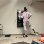 Annie Ilonzeh Instagram - Garage DIY. Finally completed my garage/home gym, and I love it. -painted the walls and ceiling -updated the electrical -epoxy’d the floor -organized and consolidated storage -set up my sauna! -pushed through during a breakdown 🙌🏽😂 #diy #handywoman #garage #garagegym #homedecor #homegym #painting