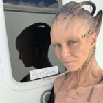 Annie Wersching Instagram - Sick of #Picard posts yet? 😉👑👽Never, you say?! Great! In honor of our panel at @wondercon today, this one goes out to the incredible artists who designed, executed and applied this tricky prosthetic. In the beginning I was called 4 hours before I was due on set. That included everything…hair in a bun, bald cap, crown on, 10 overlapping prosthetics, airbrushing and hand painting. Then costume and corset and all the rest. We very quickly got the whole shebang down to 2 1/2 hours! I’d go film some snarky BQ scenes and then it would take about 25 mins to remove the makeup pieces. I would let my hubs/family know I was almost finished by sending one of these ridiculous pics of prosthetics being cut off my face! 🤣 Some of my favorite times throughout my whole #StarTrekPicard experience were sitting in the chair being worked on by @jrmackinnon amd @kevinkirkpatrickart. I mean….what talent! And what great humans.❤️@vincentvandykefx and his team created piece after piece and @nevillepage was the concept artist for the whole thing! They did all of this while under the strictest of Covid protocols. I applaud them tremendously and I’m sure they’ll win lots of Emmys. 🏆 As they should! Don’t even get me started on @christineclarkdesign and @syzygy_designs and their ridiculously amazing detailed fittings and BQ costume…We’ll save that for next week ;) @startrek @startrekonpplus #picardbts