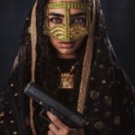 Anousha Instagram – .
It’s interesting how the media has conditioned us to pre-judge what the intentions of someone holding a gun are. We perceive it differently depending on ethnicity.
The same gun can make one person a super hero and another person a criminal.
The same gun might make you cheer for one person in a movie and fearful of another person in real life.
What is this about?
Is this merely how we were taught and do we accept these prejudices unconsciously?
Is it our conditioning?
Is someone from the middle east not capable of being a hero or a good guy? Who is going to play the role of the bad guy, then?
What if she was the hero? What if she is capable of both power and good? And she saves the world?
I think it’s everyone’s responsibility to study their conditioned mind.
Question. Observe. Look deeper.
_____________________________________________
Working with a fellow artist from the East was powerful and inspiring.
Photo by: @warriorandthegypsy 📸✨
_____________________________________________
در دنياي زندگي ميكنيم كه خودمان به هرچيزي كه خواستيم و نياز دانسته ايم معنا داديم
اون “معنا” اسم هاي ديگرش فرهنگ، شرطي شدگي، باور، اعتقاد و و و
با اين معنا ها “خود” را تعريف ميكنيم. در صورتي كه بدون اين معناها “خود” ماهيتش را تغيير نخواهد داد.
ولي بر سر معناها ميجنگيم، تفرقه رو تجربه ميكنيم، جدايي را ميچشيم و ترس را پر رنگ تر از هميشه زندگي ميكنيم.
در سينماهاي هالييودي يك زن خاورميانه اي با تفنگ معنا خاص خودش را دارد و پيامي بخصوص با خودش همراه دارد. براي اين معنا دروغين بايد با افراد زيادي كه خود را با اون معنا تعريف كرده اند به بحث پرداخت.
براي گرفتن اين عكس و ايده و پُست كردنش من بايد عكاسي رو قانع ميكردم كه ترسش را كنار بگذاريد
و با من همراه شود.
فكر اينكه پيامي كه بايد رو مردم دريافت نخواهند كرد خيلي از ماها رو مي ترساند ولي به ياد داشته باش ادم ها با تصميمي كه خود گرفتن اند به هر انچه كه هست ان معنايي كه دوست دارند را ميدهند و خود را با ان تعريف ميكنند
.
نظر شما در مورد نقش هاي افراد خاورميانه اي در سينما ها چيه؟ ايا انچه كه واقعيت هست را به تصور كشيده اند تا به حال؟
اين عكس از @warriorandthegypsy فردي بسيار خلاق و ايده پرداز. ✨