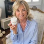 Anthea Turner Instagram - Thank you for all your kind messages for BALM 6, I think we’re going to have a lot of fun with this. It started when I was clearing out our bathroom cupboard slightly embarrassed at the amount of products Mark and I had between us. I said “Can’t we just have one pot that does everything?” For some time I’ve questioned what we really need to take care of our skin and have become cynical of the ‘fear and fix’ marketing constantly thrown at us. So, I spoke to a friend who knew a chemist with an interest in beauty products, we met, she understood what I wanted and there began my journey to this little miracle in a pot, all made in Donna’s kitchen in Kent for you and me to use and enjoy. Called BALM 6 because it is specifically designed to perform six functions 1. Cleanse and dissolve makeup 2. Be a nourishing face mask 3. Hydrate your lips 4. Preserve your hair growth 5. Preserve your eyelash and eyebrow growth 6. Moisturise and hydrate your cuticles for again healthy growth. Its big test came when I took it on holiday with me to Crete and Vickie, my Manager, also put it in her holiday case on a trip to the States, we both came back elated with the results. Our skin and hair had been nourished, protected and preserved. I’m firmly convinced now no cupboard should be without a pot of BALM 6. If you want to order a pot head to link in my bio Hope you enjoy everything about it and look forward to hearing other ideas you for it! Also shirt is from @tillsworthdefined