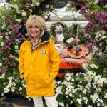 Anthea Turner Instagram - Few pictures here to show you one of my big reasons for popping over to @rhschelsea this year. It was to help champion rose breeder Ian Limmer of @peterbealesroses launch his new baby. This beautiful cluster rose called ‘With Courage’ will help raise ‘hopefully’ around 40k for the @rnli As you know, Blue Peter has a long history of support for the RNLI During my time on the show I took part in many of their training exercises, so many in fact I had my own uniform!! 30 years later I wore it proudly again and for the last time as I’ve donated it compleat with badges to the RNLI Museum in Tenby Pembrokeshire - The place aged 6 with Dad I watched my first launch. It’s not there yet but when it is I’ll feel very proud 😊 Obviously the BP fam were also there to help and just great to be with @lindseyjrussell and @missjanetellis Also a delight to meet another supporter @joannascanlanofficial 🎭 What a team !!🌺🌺🌺🌺