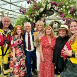 Anthea Turner Instagram - Few pictures here to show you one of my big reasons for popping over to @rhschelsea this year. It was to help champion rose breeder Ian Limmer of @peterbealesroses launch his new baby. This beautiful cluster rose called ‘With Courage’ will help raise ‘hopefully’ around 40k for the @rnli As you know, Blue Peter has a long history of support for the RNLI During my time on the show I took part in many of their training exercises, so many in fact I had my own uniform!! 30 years later I wore it proudly again and for the last time as I’ve donated it compleat with badges to the RNLI Museum in Tenby Pembrokeshire - The place aged 6 with Dad I watched my first launch. It’s not there yet but when it is I’ll feel very proud 😊 Obviously the BP fam were also there to help and just great to be with @lindseyjrussell and @missjanetellis Also a delight to meet another supporter @joannascanlanofficial 🎭 What a team !!🌺🌺🌺🌺
