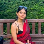 Anusha Viswanathan Instagram - All too well season. 🍁 . . . #september #alltoowell #swiftie #fall #heartbreak #love #red #saree #sareenotsorry #redsaree #parks #london #vacation #travel #endofsummer #summertan #autumncolours #aesthetic #fashion #music #magic #travelblogger #wanderlust #majormissing #nostalgia #hope #secret #fashionblogger #instablogger