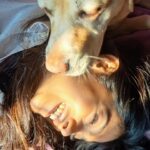 Anusha Viswanathan Instagram – Muimui দায়িত্ব নিয়ে attacking my blues.🤍
Thank you for capturing this priceless moment @adi2gupta 🌹
.
.
.
#puppylove #warm #love #hope #peace #joy #lover #beyondlove #pricelessmoments #doggo #doggolove #licks #kisses #doglover #aesthetic #sunlight #sunkissed #beachhouse #happyafternoons