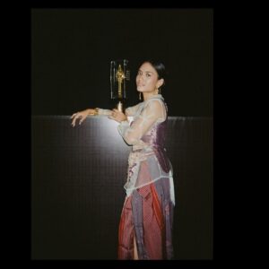Arawinda Kirana Instagram - A little bit about my outfit at FFI✨

You all know me firstly as “that #Berkain girl”😂 And how I love representing my identity through fashion, specifically kain Indonesia. 

For my very first red carpet event, I was lucky enough to meet @jonathandytan and his assistant @gloriastephanie__, people who listened, and were willing to collaborate to help channel my identity through pieces that truly represented what I stand for.

This gorgeous sheer kebaya top I am wearing is from @___anw, which is then layered by the most breathtaking contemporary purple top by @hiantjen, crafted with Indonesian textiles. Bedazzled with jewelry by @tuloladesigns and @houseofjealouxy, and brushed flawlessly by @ryanogilvy and @firdajeanhair.

What was very special, was that I wore a couple of personal good-luck tokens that night.

1) The tusuk konde I was wearing is part of the most exquisite antique Mahkota Bugis set, which my partner @bukiegn gifted to me for my birthday last month. 

2) The kain I wore that night was Songket Tenun Baron, from my personal collection, which previously belonged to my mother.

Photographs by @jonathandytan @gloriastephanie__ @agrasuseno @yestianovira
