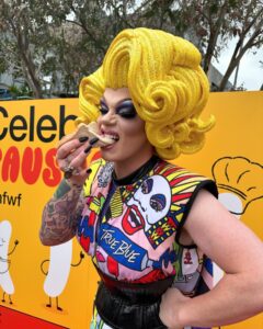 Art Simone Instagram - CELEBRITY SAUSAGE for @melbfoodandwine festival 🖤 In one of the campest moments of my career, I had the pleasure of popping by @fed.square yesterday to sample my namesake sausage! The Art Simone is still available today amongst all the creative creations by my fellow celebs, head on down grab a snag 😍