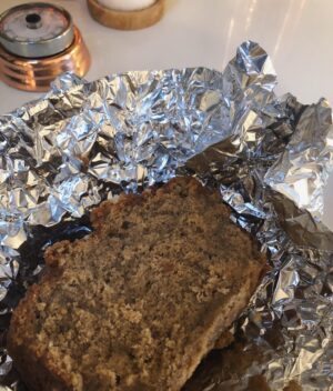 Ashley Cook Instagram - if anything at all feels important to me it is something like this— a small piece of homemade bread shared in a simple piece of foil. small and simple, but not really small or simple. these are the big things. more of this, more of this.