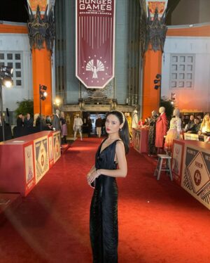 Ashley Liao Instagram - from my heart to yours 🕊️🐍 
the ballad of songbirds and snakes is in theaters NOVEMBER 17th! #TheBalladOfSongbirdsAndSnakes #TheHungerGames #ClemensiaDovecote 

hair: @mashyourhair 
makeup: @fabiolamakeup 
styling: @brianmeller 
tailoring: @travisaddams 
dress: @ysl 
earrings & bracelets: @grazielagems 
rings: @efcollection 
shoes: @louboutinworld 

and because you know i love to write a sappy caption: 

in 5th grade we gave an auditorium room style presentation about ourselves. one of the questions we had to answer was what we wanted to be when we grew up. in-front of my classmates and their parents i said that i wanted to be an actress. a few people laughed at such a far fetched dream—my mom shrugged her shoulders and knew this was all a part of something bigger. 

last night, i looked around at the lights and decorations and realized my dreams of having career as an asian american actress is my current reality. i wouldn’t be here without the sacrifice of my friends and family. it takes a village and a damn big one at that. i’m nervous and excited and optimistically cautious. there apparently isn’t a “how to cope with the anxiety of your dreams coming true at 22 for dummies” but i think my friends and team could write one.  i’m so honoured, this moment does not escape me for a second. see you on the 17th❤️