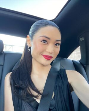 Ashley Liao Instagram - still pinching myself 🤭
#TheBalladOfSongbirdsAndSnakes
#TheHungerGames 

hair: @mashyourhair 
makeup: @fabiolamakeup 
styling: @brianmeller 
tailoring: @travisaddams 
dress: @ysl 
earrings & bracelets: @grazielagems 
rings: @efcollection 
shoes: @louboutinworld 
photo credit:  @bucknerphoto and @variety