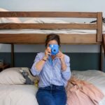 Ashley Williams Instagram – “My name’s Gus and I like small spaces,” my nine year old used to introduce himself to people this way. He loves reading, drawing, and “being cozy,” so when we considered designing a bedroom for him, the only answer was this mahogany treehouse vibe. We went to @roomandboard and had the best time designing exactly to his sensibility. He loves to sit at his desk and “imagine that I’m in the forest.” I’m obsessed with Room and Board’s sturdy, clean lined aesthetic and sometimes on stressful days I go hide in there myself. 😆 #homerenovation #kidsroom @we_are_kismet @alchemy_collective_ #roomreveal #ad