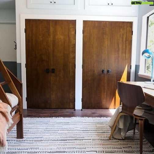 Ashley Williams Instagram - “My name’s Gus and I like small spaces,” my nine year old used to introduce himself to people this way. He loves reading, drawing, and “being cozy,” so when we considered designing a bedroom for him, the only answer was this mahogany treehouse vibe. We went to @roomandboard and had the best time designing exactly to his sensibility. He loves to sit at his desk and “imagine that I’m in the forest.” I’m obsessed with Room and Board’s sturdy, clean lined aesthetic and sometimes on stressful days I go hide in there myself. 😆 #homerenovation #kidsroom @we_are_kismet @alchemy_collective_ #roomreveal #ad