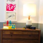 Ashley Williams Instagram - “My name’s Gus and I like small spaces,” my nine year old used to introduce himself to people this way. He loves reading, drawing, and “being cozy,” so when we considered designing a bedroom for him, the only answer was this mahogany treehouse vibe. We went to @roomandboard and had the best time designing exactly to his sensibility. He loves to sit at his desk and “imagine that I’m in the forest.” I’m obsessed with Room and Board’s sturdy, clean lined aesthetic and sometimes on stressful days I go hide in there myself. 😆 #homerenovation #kidsroom @we_are_kismet @alchemy_collective_ #roomreveal #ad