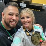 Ashley Yoder Instagram - It ain’t much but it’s honest work😂💀🙌🏽reallllly proud of our girls I know we missed @doykfam and her gold medal for the pic but way to go ladies🙏🏽♥️ me trying not to grab the gi is 🤣🤣🤣 thank you @rollpayments for always supporting me🔥