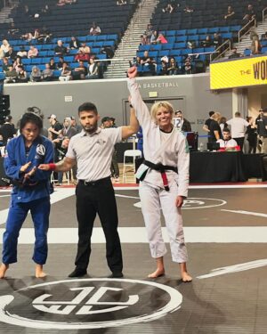 Ashley Yoder Instagram - It ain’t much but it’s honest work😂💀🙌🏽reallllly proud of our girls I know we missed @doykfam and her gold medal for the pic but way to go ladies🙏🏽♥️ me trying not to grab the gi is 🤣🤣🤣 thank you @rollpayments for always supporting me🔥