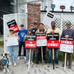 Ashly Burch Instagram – A picture of the Mere Mortals writers   unofficial mascot Cody out on the picket line from a few weeks ago. And a picture of the rally last Wednesday. We’re still out here, goin’ strong!