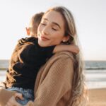 Aurora Culpo Instagram - When fear knocks at your door, send faith to answer and no one will be there. During my divorce, I lost so much sleep worrying about things that never ended up happening. I dreaded breaking the news to my kids that mom and dad would live in separate houses. When I finally mustered up the confidence to have that conversation with them, their response was: “Cool. Can I have a cookie?” 😑 I worried about how I would support myself alone, live solo for the first time ever and start from scratch on a life I never prepared for. After a year of living together WHILE divorced, dragging our feet toward the inevitable, I finally moved into my own place. It hurt to leave behind the home I had designed every inch of, with so many memories as a family, and into a smaller rental which was not at all my ideal space. I knew things could go one of two ways: I could be a victim, or I could turn this shit into a Phoenix rising from the ashes🔥. I made a pact with myself that first day in my new place, August 4th, that I would feel every emotion fully & cut out everything I had used to numb: alcohol, xanax, (chocolate chip cookies could stay). Many days I didn’t see the a light at the end of the tunnel. However, I knew from experience that if you lean into faith, the universe will always meet you half way. I started my podcast & my career took off in ways I could have never imagined as I put one foot in front of the other with an unwavering single mindedness on strength and faith. ( & @doc_amen to get off adhd meds) My relationship with my ex hasn’t been smoothe sailing every day, but we both made the choice to show a mutual respect even on the days we don’t fully feel it. We choose to lean into the shared love for our kids and an understanding that how we speak about eachother and treat eachother is potentially the greatest gift we can give our kids. Of course some days are a bitch but if there’s one thing I’ve learned these past few years it’s that worry doesn’t take away tomorrow’s troubles, it takes away today’s strength- and we are so much stronger than we ever could have known ❤️
