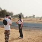 Becky James Instagram - I travelled to Africa to deliver Hardest Geezer a pint from his local pub. let’s be real, the man deserved a pint. huge thank you to russell and his team for allowing us to join such an mental mission, @the.goose.worthing pub for letting us literally steal a pint and james connor & charlie who went along with a very daft idea. 🤌🏼 peace, love, worthing pints X (don’t forget to donate what you can to russ - link in his bio @hardestgeezer)