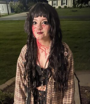 Bella Higginbotham Instagram - Happy Halloween from your favorite haunted house scare actor 🎃🔪💀Been too busy working and writing college application essays but couldn’t let today get away without a BOO 👻 👻👻Swipe for a peek at my French ghost character —video in stories!🇫🇷(first pic is just me after work one night)
.
.
#halloween
#scareactor 
#hauntedhouse