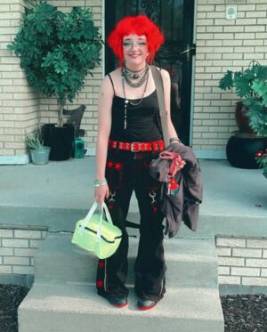 Bella Higginbotham Instagram - Flying into SENIOR year   summer insta-break over.  How’d ya spend your summer vacation? 

@trippnyc pants from @trashandvaudeville 

#classof2024 #senioryear #trippnyc #trashandvaudeville #schoolfashion #alternativefashion #koolaidhair