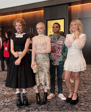 Bella Higginbotham Instagram - What a trip…!!! I am sooo grateful to @hardrockhotelnyc   @afauniverse   @barbiealynwoods for the amazing premiere party, to the awesome @syfy team for my first @newyorkcomiccon ever (which was fantastic!!), and always and forever to @realdonmancini for creating all of it, especially Nadine. THANK YOU 
♥️🎉⭐️💥😝♥️ 
White dress:: vintage 90s from my mom
Black dress:: thrifted in Vancouver
Boots:: @demonia.shoes 
Hair   makeup   styling:: me