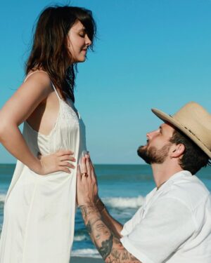 Bethany C. Meyers Instagram - Things are expanding in the Meyers-Tortorella household—our hearts, our family, and my belly. 🥰 We are happy to announce that baby number two is coming in October.

It took years to conceive our first, and this baby made its way into our lives as soon as we touched down at the ocean, which still feels completely surreal. Already, I see the personality differences between our first and second. Which makes me feel like so much of fertility and family expansion is divine timing. We did all the earthly tactics to get our babies, while our babies did all the heavenly ones. Together, we combine forces to prepare for their grand entrance into the world.

To @nicotortorella, I can’t wait to go down this path again—one that is both familiar and completely unknown. Thank you for being the ultimate belly-rubber, crepe-finder, and Kilmer-soother so I can tack on another 30 minutes to my nap. Kilmer Dove, you are my first, and I love you. But pretty soon, I’m gonna need you to stop jamming your finger into my belly button while yelling ‘BA BA!!’

Lastly, I want to acknowledge that when you’ve experienced pregnancy loss or have struggled to conceive, pregnancy announcements always feel bittersweet, sometimes even your own. It’s not lost on me that some people reading this are still hoping for their first while I announce my second. There are never any words that make it better, so I won’t try to offer them. I will just let you know that you are seen and your sorrow is held, even in my joy.

Love you all. Thank you, as always, for the endless support and understanding as we make these big life changes. 

Photos by Uncle Wook @rocco_tortorella