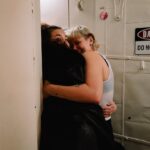 Betty Who Instagram - some moments from my last day at the Walter Kerr 😭🚂🍷 i am endlessly grateful i got to ride that train to the end of the line with my new and now forever family @hadestown i think it’s gonna take me a while to stop constantly running steps and songs in my head getting ready for that nights performance. thank you to every single one of you who have supported me on this journey! it’s so vulny! to just… do something you have literally never done before and just hope you don’t embarrass yourself! so many of you have been sooo kind and reassuring. the way i have been gassed up at stage door by some of yall?!?!? and god bless my FRIENDS. you beautiful people. who have been so patient and gentle with me while this schedule has taken over my life. i know shows are expensive and not everyone is a musical theatre nerd like me! the fact that so many of you travelled from far and wide to buy a ticket to Hell just to show up for me blows my mind. i love you all so much. sharing a closing night with @_solaylay will be a core memory for ever and ever. it’s rare at this age to connect with someone and feel like you’ve been friends since birth. that’s me and this silly goose! see u soon bean u’ll never be rid of me now! finally just a lil note about @zcassar this man. this MAN!!! zak has been the most supportive partner to me in the last six months in a way i can’t really put words to. this lifestyle is hard, especially being away from home for as long as we have been. to imagine doing it without him seems impossible. not to mention sitting yesterday with him, going through the images he has captured of this part of my life. the way he sees the world is such beautiful art. he always says his best pictures are the ones he takes of people he loves. that’s why his best pictures are always of me 🥹😭😭😭 this has been such a huge chapter. i have learned so much and am SO. GRATEFUL! if there’s one thing about me, it’s that i’m just a show girl at heart! HERE’S TO MORE SHOWS! MORE WIGS! MORE ADVENTURES IN THE THEATRE TO COME! ⭐️