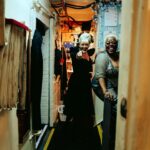 Betty Who Instagram - 5 left 👠🥀🖤 @hadestown these photos of me calling lillias down the stairs before we open act 2 together will never cease to remind me how CRAZY it is that i’ve gotten to share the stage with her. broadway legend Lillias f*cking White!!! i have learned so much and she makes me LAUGH. she doesn’t just sing, she channels. music feels better coming from her, it feels divine, it feels touched. like the way she’s singing it was what was written on the cosmic page all along. it’s been my absolute honour to learn from the best and call you my friend @lilliaswhiteofficial ❤️😭 i also love that Zak captured the hallway next to stage. it’s just. a hallway. decorated with love by our stage managers. yet it holds legends! awaiting their places call! legends who are about to change someone’s life on the other side of that hallway. idk man. i love the theatre.