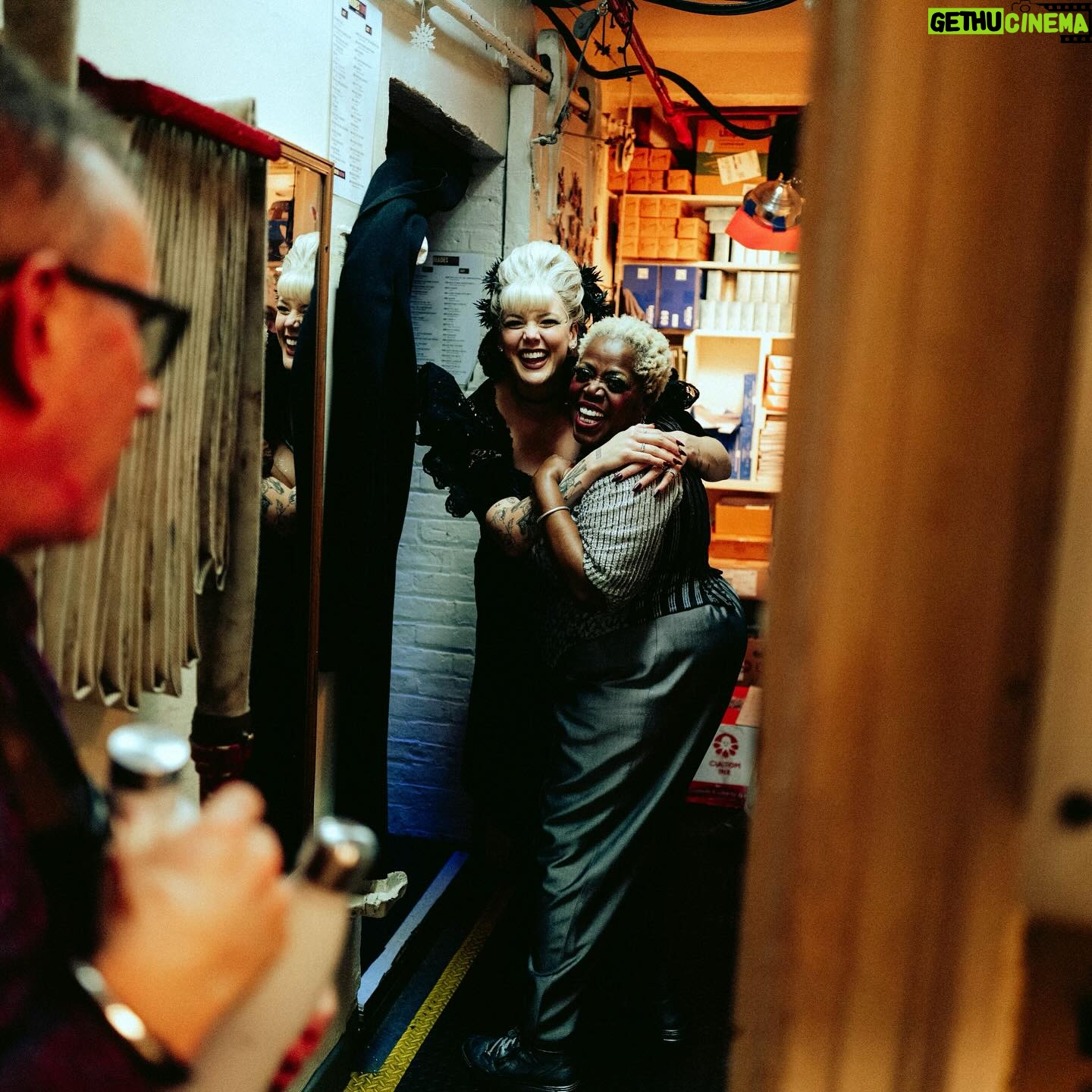 Betty Who Instagram - 5 left 👠🥀🖤 @hadestown these photos of me calling lillias down the stairs before we open act 2 together will never cease to remind me how CRAZY it is that i’ve gotten to share the stage with her. broadway legend Lillias f*cking White!!! i have learned so much and she makes me LAUGH. she doesn’t just sing, she channels. music feels better coming from her, it feels divine, it feels touched. like the way she’s singing it was what was written on the cosmic page all along. it’s been my absolute honour to learn from the best and call you my friend @lilliaswhiteofficial ❤️😭 i also love that Zak captured the hallway next to stage. it’s just. a hallway. decorated with love by our stage managers. yet it holds legends! awaiting their places call! legends who are about to change someone’s life on the other side of that hallway. idk man. i love the theatre.