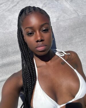 Birgundi Baker Instagram - resting beach face.