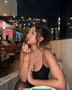 Briana Jones Instagram - october is my month 🍒💋🥀🦂