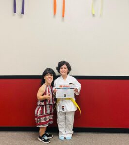 Briana Renee Instagram - In just a few short weeks, my big girl leveled up to her yellow belt in Kenpo🥋🌠 Leiana is a natural at whatever she puts her energy into, and I couldn’t be more proud of her 💜 #littlebutfierce #futureblackbelt #theskyisthelimit