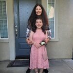Briana Renee Instagram - And just like that 🫰🏻Leiana is off to her first semi-formal school dance 🌸 She will be graduating 8th grade next week, and growing into such a gorgeous young lady {inside and out} 💗 Maverick had to get dressed up in his own way 🤪 I’m in awe of who my girl has become, and I’m so blessed that her spirit chose me to be her mama 🌸 #bestillmyheart #proudmama #firstdance #highschoolbound