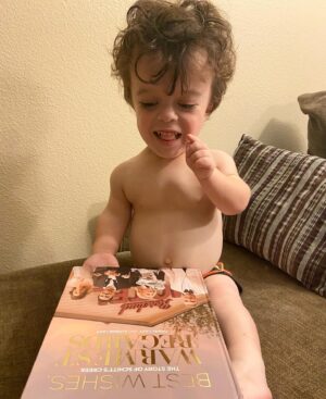 Briana Renee Instagram - My copy of “Best Wishes Warmest Regards” by @instadanjlevy & Eugene Levy arrived today, and Maverick has claimed it as his own😍 He has been “reading” each page, and loves it almost as much as I love the show 👉🏻 @schittscreek 💜 Thank you Dan & Eugene Levy for creating the perfect series #schittscreek #bestshowever