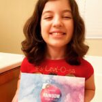 Briana Renee Instagram - My pretty Valentine 💜 loves her happy cloud @ribivaul_bathbombs l~ they literally release a rainbow, and that face doesn’t get any cuter ☁️🌈👉🏻 #growingtoofast #beautifulgirl #tallerthanme #proudmama #happyvalentine #ribivaulbathbomb