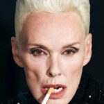 Brigitte Nielsen Instagram - @interviewmag “I’ve been down and out, but I never give up.” Atomic blonde @realbrigittenielsen talks sobriety, political correctness, surgery, and conquering a new generation of fans with her Hollywood girlfriend @sharonosbourne in our Spring issue. Photography by @ilya_lipkin Styled by @charlottecolletcollet Hair: @josephpujalte Makeup: @christinecorbel Nails: @sally_derbali Set design: @giovannamartial_ Movement director: @ryanchappell Tailor: @lauragiafferi Retouching: @mcd.creative Location: @rouchonparis Brigitte Nielsen agency: @margauxtheagency Prod. by @themorrisongroup