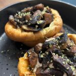 Briony May Williams Instagram - Next up in my Sensationally Seasonal Series are mushrooms 🍄 I know a lot of people love to hate them but I think they are great and these Mini Dutch Baby Pancakes with Mushrooms are a different take on a big version I made last week on Morning Live ❤️ These would make a great breakfast, lunch or dinner and you can mix up what you fill them with 💕 Enjoy! Ingredients Pancakes 2 tbsp vegetable oil 100g plain flour 3 large eggs 150ml milk ½ tsp salt 1 tsp mixed herbs Filling 20g butter 250g button mushrooms 2 tsp smoked paprika 2 tsp cumin Dressing 2 tbsp creme fraiche 1 tsp smoked paprika 1 tsp cumin Method Oven on 220C. Divide the vegetable oil between 6 muffin spaces in a muffin tin then pop in the oven. In a bowl, mix the flour, eggs, milk, salt and mixed herbs then blitz with a stick blender or whisk well until smooth. Transfer to a jug. Let rest for 5 minutes. Open the oven, pull out the tray with the pan on and pour in the batter evenly between the 6 muffin spaces (it should sizzle). Close the oven and bake for 20 minutes until risen (they should look like yorkshire puddings). Whilst the pancake is cooking, prep the filling. Heat a drizzle of oil in a frying pan then add the mushroom and cook for 5 minutes until starting to brown. Add the butter and the spices plus a pinch of salt and pepper and cook for a further 5 minutes. Mix the creme fraiche and spices together with a pinch of salt and pepper. Retrieve the pancakes from the oven, slice open, spread the creme fraiche mixture over the base, sprinkle on the mushrooms, top with a sprinkle of salt and serve. #recipe #seasonal #seasonalfood #cake #yummy #delicious #tasty #homebaking #baking #cakedecorating #homebaker #dessert #bakery #edible #mushrooms #pancake #dutchbabypancake #savoury #pancakeday #mouthwatering #ingredient #easyrecipes #foodideas #instruction