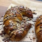 Briony May Williams Instagram - Has this epic trend popped up on your feed yet?!? I’ve seen it so many times…people packing their croissants with cookie dough and baking them so I thought how can we take that a step further?! I know! I had some left over cookie dough so I smothered croissant dough in cookie dough then cooked it and got these beauties 🥐 #naughtybutnice