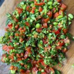 Briony May Williams Instagram - I wanted to try out the viral chopped filling sandwich and it was SO YUMMY!!! You can make it with whatever ingredients you want/have in your fridge but if you want this combination, I’ve popped it below ❤️ It’s a fab, easy, healthy lunch that also happens to be delicious 😋 It would work really well as a salad too. What would you put in yours?!? Briony’s Chopped Filling Sandwich Half red pepper, 5 cherry tomatoes, handful spinach, handful rocket, 1/2 avocado, handful edamame beans. Yogurt dressing = 2 tbsps Greek yogurt, 1tsp smoked paprika, 1 tsp cumin, 1 tbsp honey all mixed together. #choppedsandwich #choppedsalad #protein #highprotein #highproteinmeals #quicklunch #food #homecook #trend #delicious #healthy #recipe #easymeals