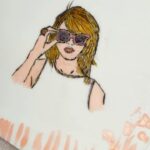 Briony May Williams Instagram - Happy Taylor Swift Day ❤️ I made a Taytay cake for a very special young lady yesterday and here’s my attempt at drawing Ms Swift on fondant using edible ink pens 💕 Very happy with how it turned out! Will pop the full cake up tomorrow ♥️ #taylorswift #cakecakecake #cakedecorating #cakedesign #cakeart