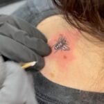 Briony May Williams Instagram - I had this little bee-auty done just before my birthday in October and I absolutely love it!!! Had my little hearts topped up too 💕 Thank you @roseftattoo for my bee-autiful new addition 🐝 #tattoo #bee #beetattoo #hearttattoo