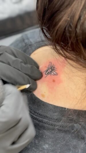 Briony May Williams Instagram - I had this little bee-auty done just before my birthday in October and I absolutely love it!!! Had my little hearts topped up too 💕 Thank you @roseftattoo for my bee-autiful new addition 🐝 #tattoo #bee #beetattoo #hearttattoo