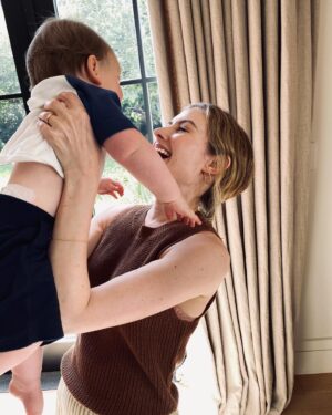 Caitlin Thompson Instagram - He made me a mother and gave me mom arms. Love my boy. Happy Mother’s Day!!