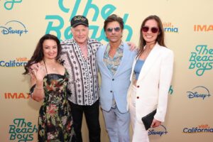 Caitlin McHugh Instagram - NEW @thebeachboys documentary on @disneyplus May 24! So many great interviews, wonderful footage from the early years and a beautiful reunion. 

And the band is still going strong, 63 years later! Swipe for video from their incredible @hollywoodbowl 4th of July show with a live orchestra last year. Their Endless Summer Gold Tour is happening now! @johnstamos is joining on some of the dates. Hope to see you at a show soon!