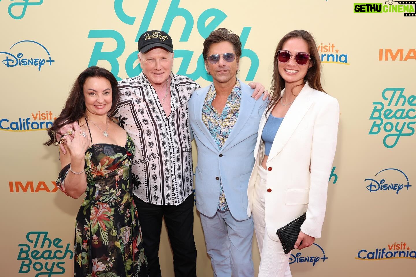 Caitlin McHugh Instagram - NEW @thebeachboys documentary on @disneyplus May 24! So many great interviews, wonderful footage from the early years and a beautiful reunion. And the band is still going strong, 63 years later! Swipe for video from their incredible @hollywoodbowl 4th of July show with a live orchestra last year. Their Endless Summer Gold Tour is happening now! @johnstamos is joining on some of the dates. Hope to see you at a show soon!