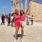 Camille Anderson Instagram - Acropolis Barbies! 👱🏻‍♀️👧🏻 Athens was a beautiful experience… culturally rich, loved seeing Acropolis, walking through the city streets, and enjoying the views from our hotel rooftop. The video on the last slide gives a great perspective. 🏛️Have you been? I’d love to hear your thoughts! ⬇️ Last stop Paris! …. #athens #greece🇬🇷 #acropolis #happy13thmonth_fu