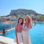 Camille Anderson Instagram - Acropolis Barbies! 👱🏻‍♀️👧🏻 Athens was a beautiful experience… culturally rich, loved seeing Acropolis, walking through the city streets, and enjoying the views from our hotel rooftop. The video on the last slide gives a great perspective. 🏛️Have you been? I’d love to hear your thoughts! ⬇️ Last stop Paris! …. #athens #greece🇬🇷 #acropolis #happy13thmonth_fu