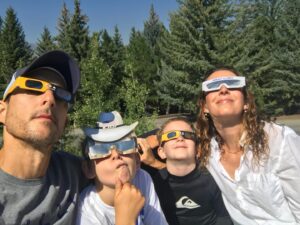 Candace Nelson Instagram - ⏮️ Throwback to the solar eclipse of 2017 🌒

It was a perfect day in Sun Valley without a cloud in the sky, and we were lucky to be in the path of totality. I remember everything getting very quiet and cool - almost chilly - on this hot August day. It became progressively dark and as the sun slipped behind the moon entirely, a cheer erupted from a neighboring watch party, echoing across the valley. It was a magical and awe inspiring event. 

Who is excited to watch today? ✋🏻

Ps: why do eclipse glasses have to be so goofy looking?
 
 

#solareclipse #solareclipse2024 #familytime #candacenelson #entrepreneurwomen